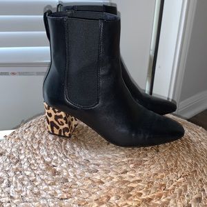 Pair of black boots with calf hair